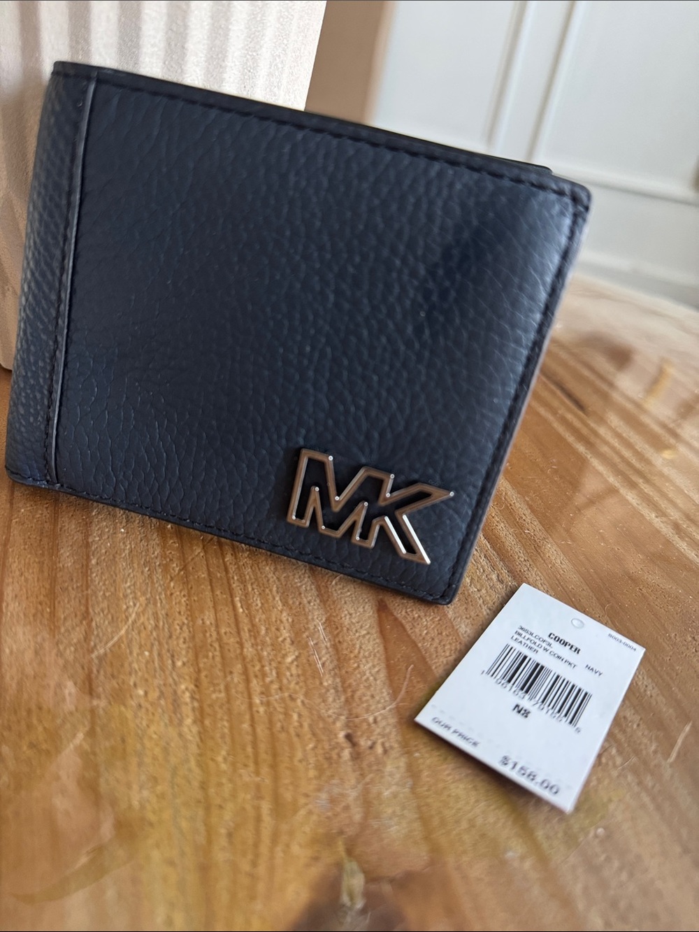 Michael Kors Black Pebbled Leather Bi-Fold Wallet with MK Logo